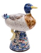 *David Cleverly [Contemporary] two earthenware figures: of a displaying turkey stag on an upturned