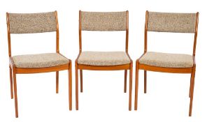 A mid to late 20th Century Danish teak dining table and eight chairs:,