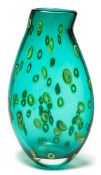 An art glass vase: of flattened oviform with asymmetric neck and wedge shaped profile,