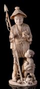 A large Japanese carved sectional ivory figure of a fisherman and son: the smiling man holding a