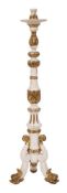 An Italianate carved giltwood and later white painted torchere:, with turned, foliate,
