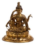 A large Chinese gilt-bronze figure of Guanyin: seated in dhyanasana,