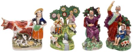 A group of four Staffordshire pottery figures: two of Walton type with bocage backgrounds,
