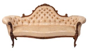 A Victorian carved rosewood settee:,