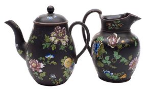 A Wedgwood enamelled black basalt coffee pot and cover and a similar baluster jug: each painted in