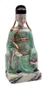 A Chinese famille rose figure of a dignitary and a Japanese figure of Sakata Kaido-maru: the
