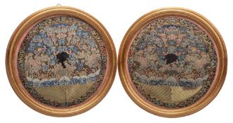 A pair of 19th century Chinese Kesi roundels: worked in coloured silks of pinks, blues,