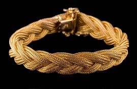 A bracelet of plait design: the clasp stamped '720', approximately 29gms gross weight.