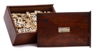 A 19th century set of 'Spelling Alphabet' bone counters: each with a single letter to either side,