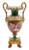 An English porcelain two-handled vase: of neo-classical form moulded with acanthus,