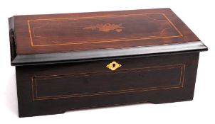 A late 19th century Swiss music box playing six airs: with ratchet lever winding to the 11cm,