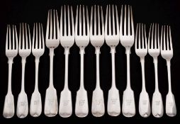 A set of five Edward VII silver Fiddle Pattern table forks, maker Walker & Hall , Sheffield,