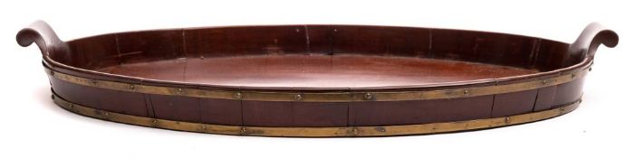 A Georgian mahogany oval tray: of coopered construction,