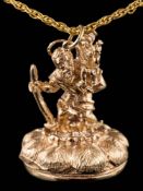 A 9ct gold and black onyx 'St Christopher' seal pendant: approximately 34mm total length,