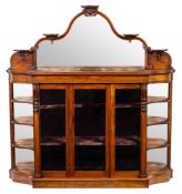 A Victorian walnut credenza:, of shaped outline,