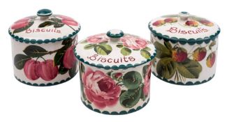 Three Wemyss pottery biscuit boxes: of squat cylindrical form,