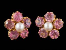 A pair of pink tourmaline and seed pearl-set floral cluster earrings: each with a single,