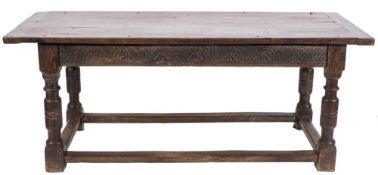 A 17th Century and later oak refectory table:, with an overhanging plank top,