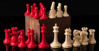 Jaques, London, an ivory Staunton pattern chess set, one side stained red, the other left natural,