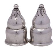 A pair of Georg Jensen silver condiments, stamped marks and bears import marks for Stockwell & Co,