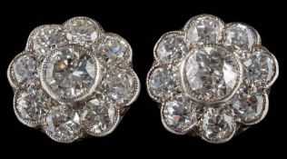 A pair of diamond mounted circular cluster ear-studs: 9.