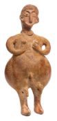 An Indo-Persian terracotta fertility figure: with moulded face, hair detail,