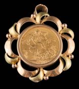 A sovereign dated 1912 mounted as a pendant/brooch: within a frame stamped '750',