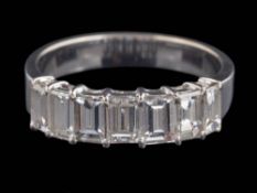A baguette-cut diamond half hoop ring: with seven slightly graduated baguette-cut stones,