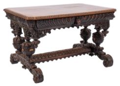 A Victorian Gothic carved oak centre table:,