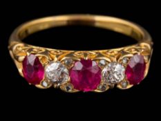A ruby and diamond five-stone ring: with graduated, oval rubies and round old,