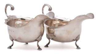 A pair of Edward VII silver gravy boats, maker Williams Ltd, Birmingham,