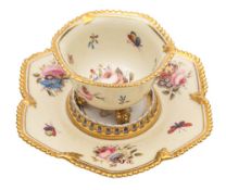 A Flight Barr & Barr Worcester tripod cabinet cup and stand: of hexagonal petal shape with