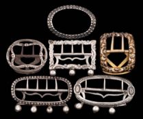 Six assorted silver buckles and garter buckles,