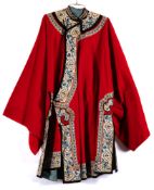 An early 20th century Chinese embroidered jacket: with blue and white embroidered collar and