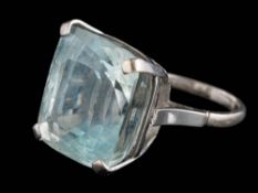 A cushion-shaped blue topaz single-stone ring: the pale blue topaz 21mm long x 19.