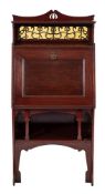Shapland & Petter A mahogany bureau:, of small size,