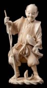 A Japanese carved ivory figure of a fisherman: wearing traditional costume with fishing pole in one