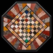 A Victorian black marble and Italian inlaid marble octagonal games table:,