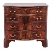 A 19th Century mahogany serpentine fronted chest:,