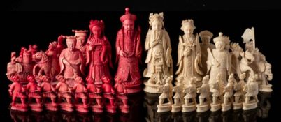 A late 19th century Chinese export ivory Mandarin pattern chess set: one side stained red,