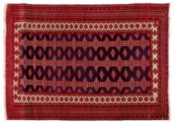 An Indo Persian rug:, of Turkoman design,