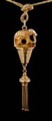 An elephant motif pendant with tassel drop and on curb-link chain,:approximately 20gms gross weight.