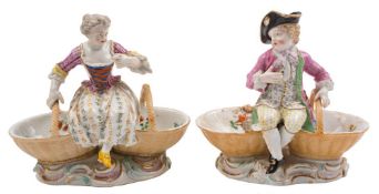 A pair of Meissen figural salts: in the form of a boy and girl,