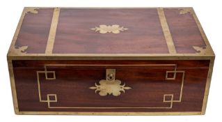 A 19th century mahogany and brass bound writing slope: the hinged lid enclosing a replaced red