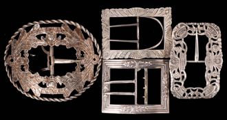 A large French silver belt buckle stamped marks: of oval outline with thistle decoration 11.