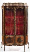 A French stained beech, decorated and gilt metal mounted vitrine:,