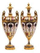 A pair of large Royal Crown Derby two-handled vases and covers: in the 'Old Imari' pattern with