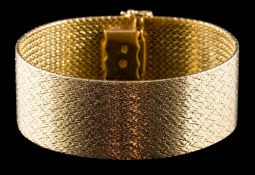A heavy mesh-link bracelet: approximately 17.8cm long x 2.