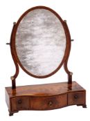 A George III mahogany and inlaid serpentine-fronted platform toilet mirror:,