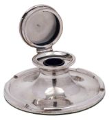 An Edward VII silver capstan inkwell, maker Asprey & Co Ltd, Birmingham,